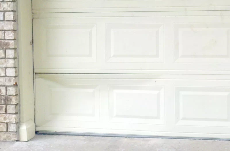 Garage Door Panel Repair Service with Expert Guidance on Costs and Options