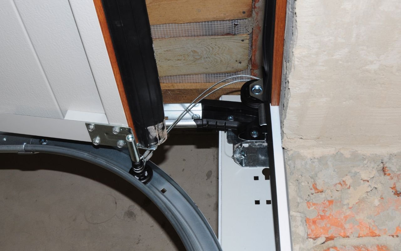 Expert technician performing Garage Door Cable Repair quickly and safely.