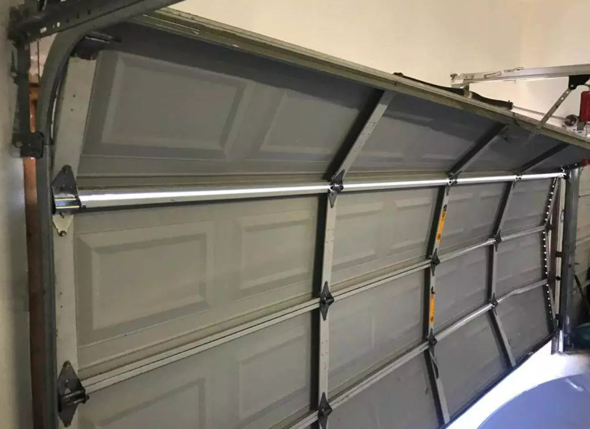 Professional technician providing expert garage door repair service in Bradenton, ensuring smooth and reliable operation.