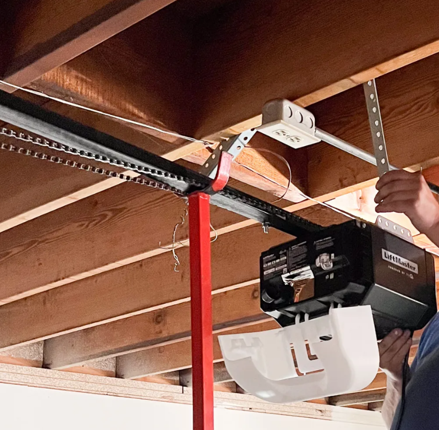 Professional technician performing garage door opener repair in Bradenton, ensuring smooth and efficient operation for residential and commercial properties.